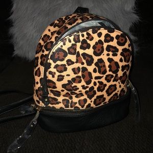 Leopard print convertible 3 n 1 purse (backpack)